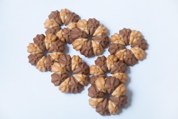 Butter cookies different form on white background