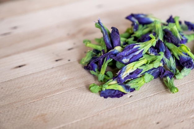 Butterfly pea Blue pea dried flower Clitoria ternatea L on wood table