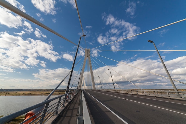 Cable stayed bridge over the Oka river near Murom and Navashino with blue sky