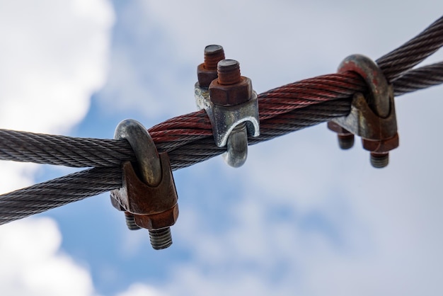 Cable with fastening with bolts and nuts of outdoors