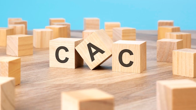 CAC written on wooden cube business concept