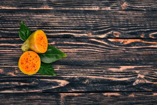 Cactus fruit Tropical Fruits On a wooden background Top view Copy space