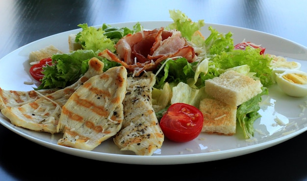 Caesar salad on the plate ready to serving for client