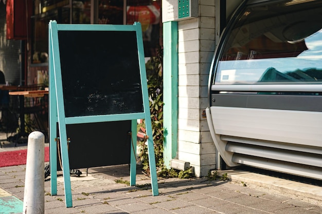 Cafe blank signboard on the street mock up