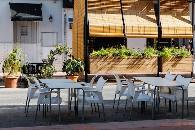 Cafe tables outside on a hot summer day