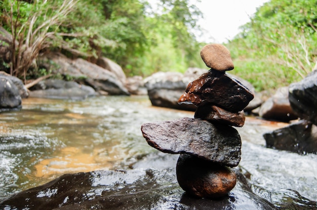 Cairn on river in morning