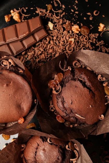 Cake of chocolate fondant cake chocolate muffins with walnuts raisins and grated chocolate