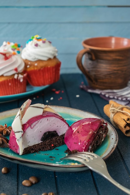 Cake and a cup of coffee on a wooden background Dessert for breakfast copy space