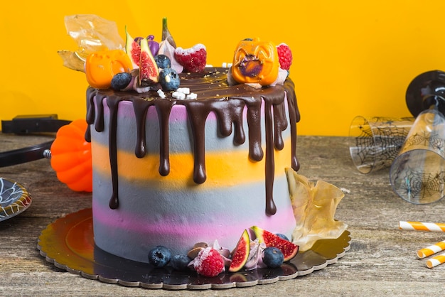 Cake halloween dessert with chocolate and fruits