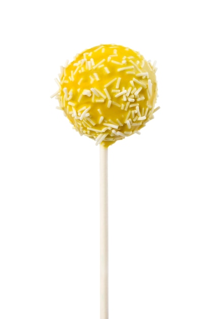 Cake pop in yellow frosting with decorative white sprinkles