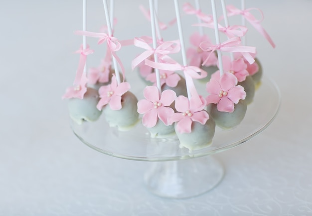 Cake pops on glass on glass