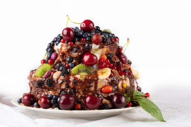 Cake with fruits on a white background A beautiful fruity dessert