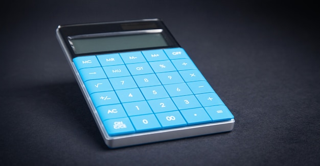 Calculator on the black background.