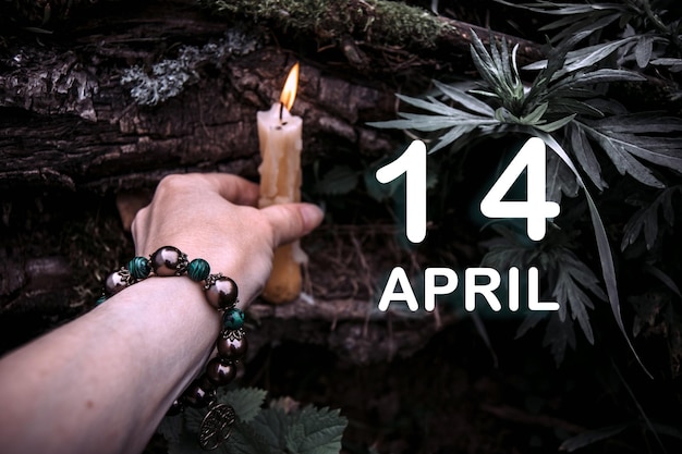 Calendar date on the background of an esoteric spiritual ritual April 14 is the fourteenth day of the month