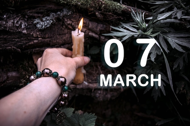 Calendar date on the background of an esoteric spiritual ritual March 7 is the seventh day of the month