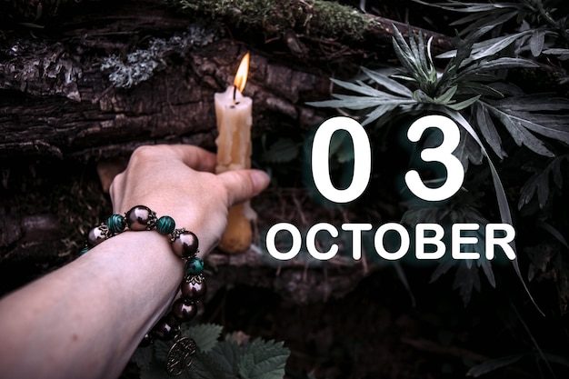 Calendar date on the background of an esoteric spiritual ritual October 3 is the third day of the month