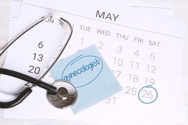 Calendar and stethoscope.