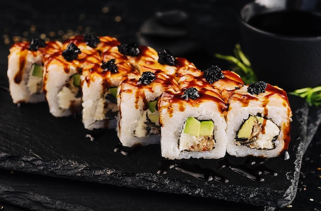 California Sushi roll with tuna vegetables and unagi sauce