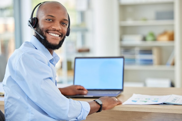 Call center agent black sales man and consulting support or advice with headset and laptop African portrait and consultant crm telemarketing and contact us work or customer service operator