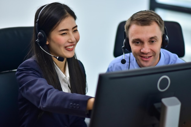 Call center concept Asian women are operator Call center working online support Call center concept for technology communication