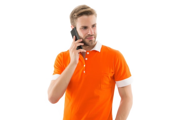 Call friend Call center How can I help you Man casual style phone conversation white background Man use mobile phone Modern technology Listening with attention Confident guy speak phone