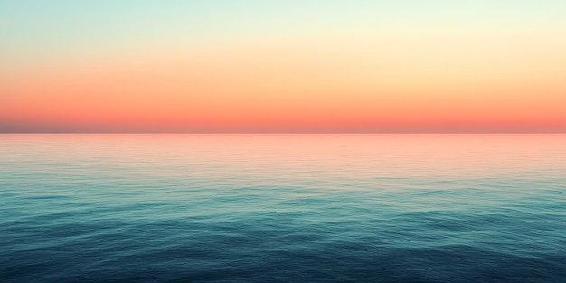 Photo calm blue ocean with a pink sunrise sky