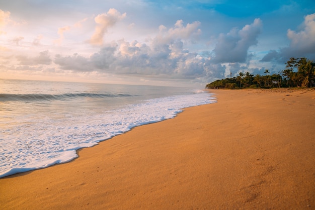 Calming summer natural marine blue background . Sea and sky with white clouds