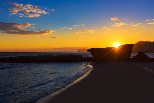 Calpe Alicante sunset at beach Cantal Roig in Spain