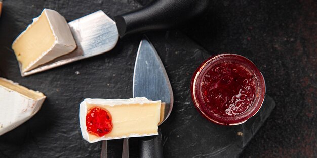 camembert or brie cheese head of soft cheese healthy meal food diet snack on the table