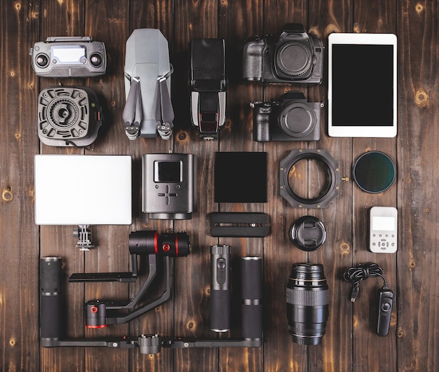 camera gear on wood top view