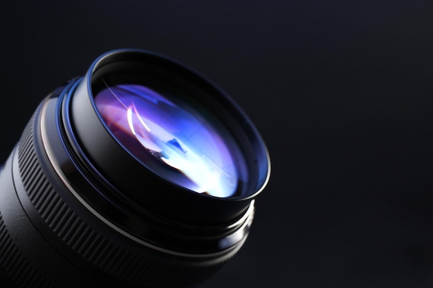 Camera lens on dark background