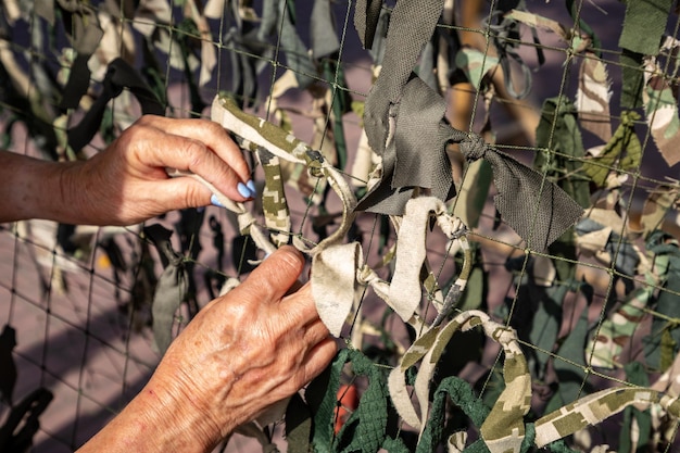 Camouflage net for the protection of military equipment in war