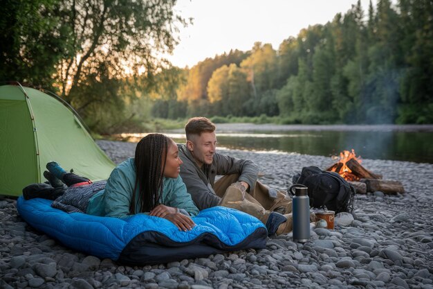 Photo campfire by the river with friends