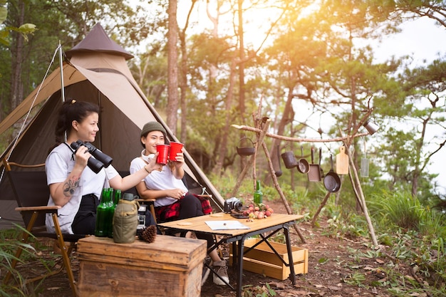 Camping concept Group of diverse friends enjoying summer party together