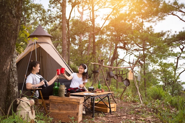 Camping concept Group of diverse friends enjoying summer party together