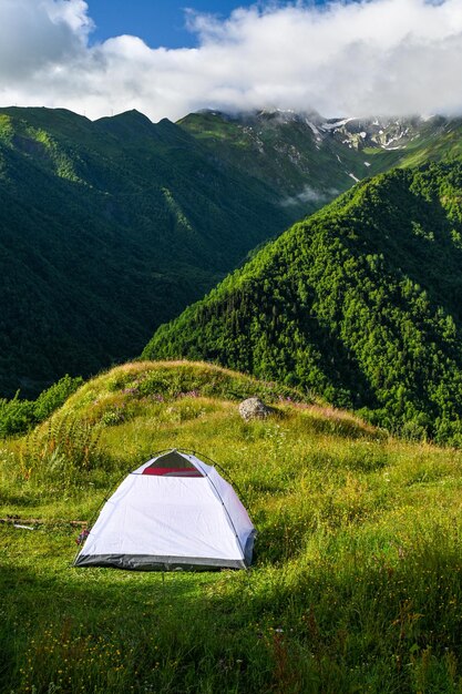 Camping in a tent with a view of the mountains