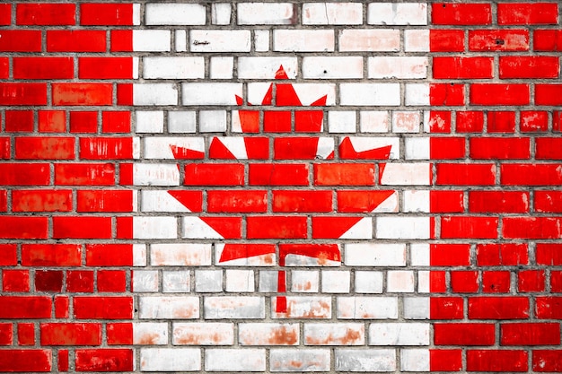 Canadian flag on a grunge brick background