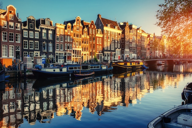 Canal at sunset. Amsterdam is the capital