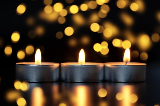 Candle flame with abstract bokeh background