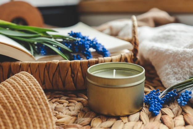 Photo candle and flowers in home atmospheric interior