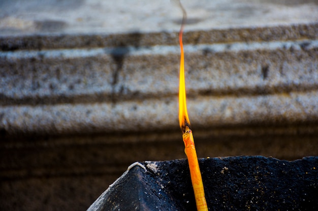 Candle light To worship the sacred. Respect for Buddhism is the belief of Thai Buddhists.