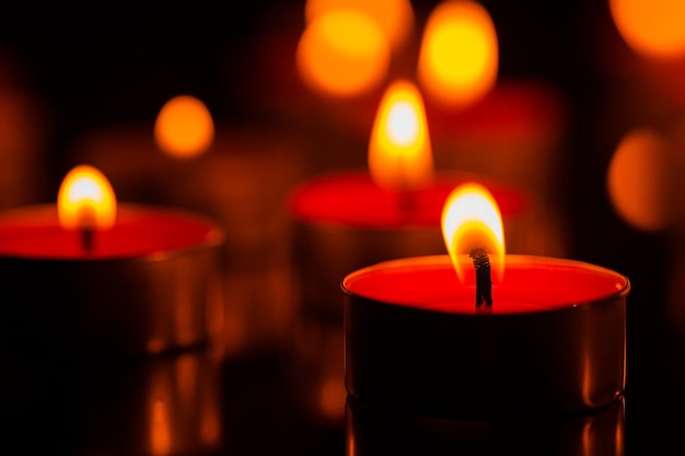 candleMany candles burn with a shallow depth of field