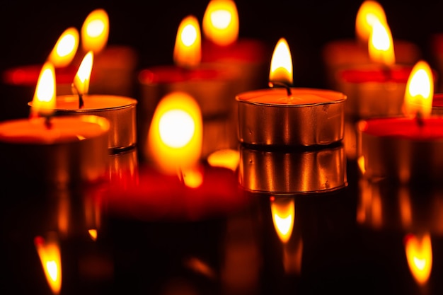 CandleMany candles burn with a shallow depth of field