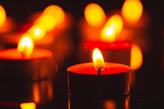 CandleMany candles burn with a shallow depth of field