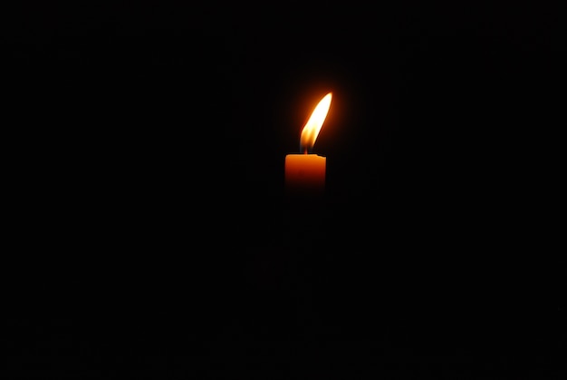 candles burning in the dark