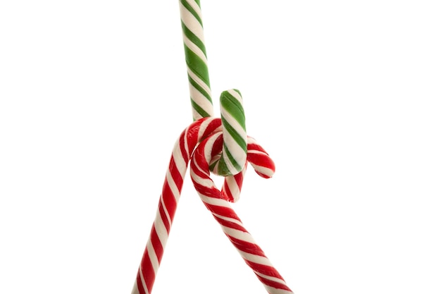 Candy cane on white background Traditional Christmas edible decoration New year concept.