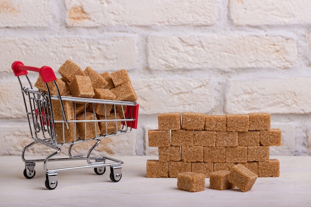 Cane sugar cubes are unloaded from the cart