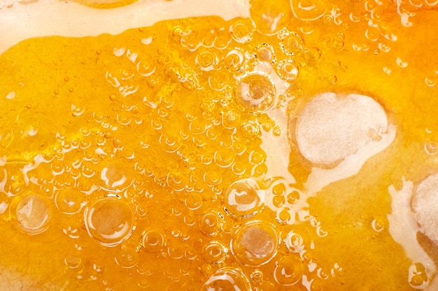 Cannabis golden wax texture, high THC content.