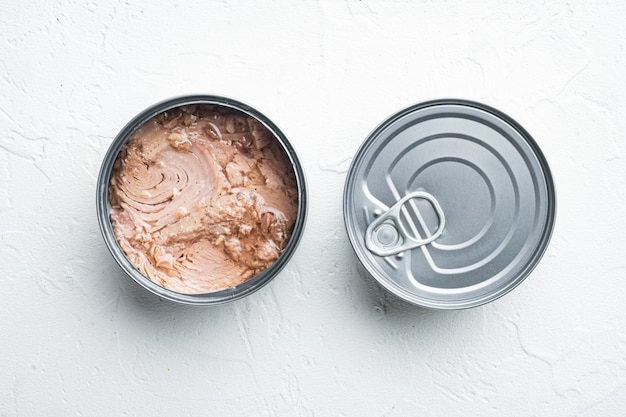 Canned Albacore Wild Tuna set, in tin can, on white, top view flat lay