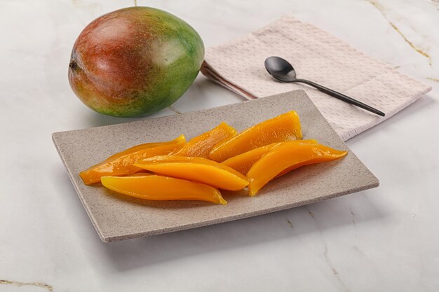 Canned mango slices in the bowl